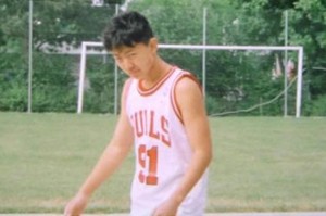 A young Kim Jong-Un wears a Rodman jersey.