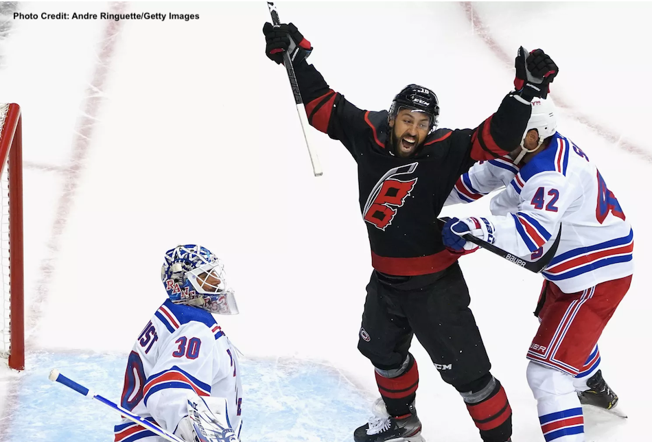 The Carolina Hurricanes are the first team to advance out of the Stanley Cup qualifying series, sweeping the New York Rangers.